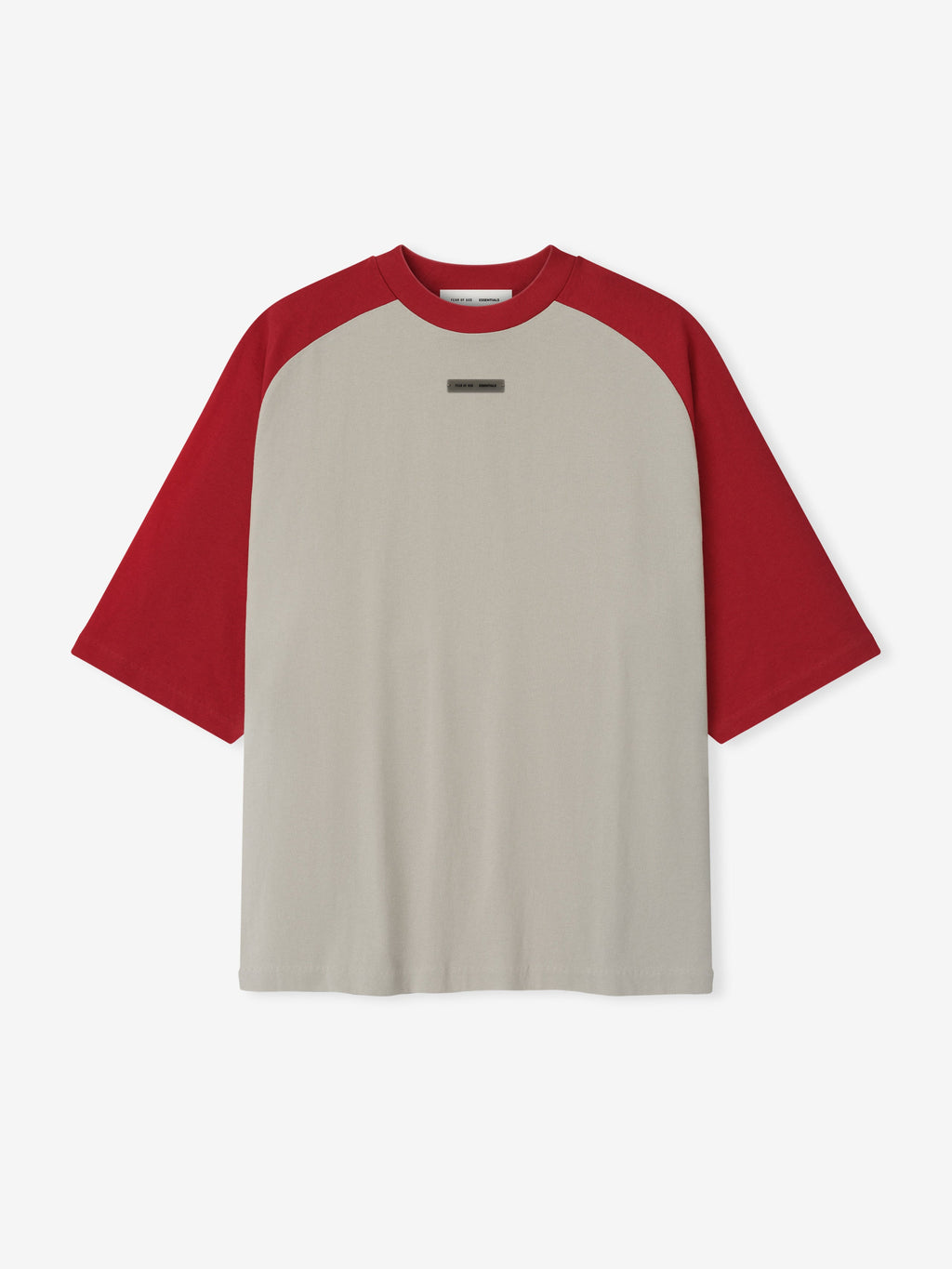 Flat lay of smoke grey baseball tee with bold crimson raglan sleeves and small rectangular label on chest center.