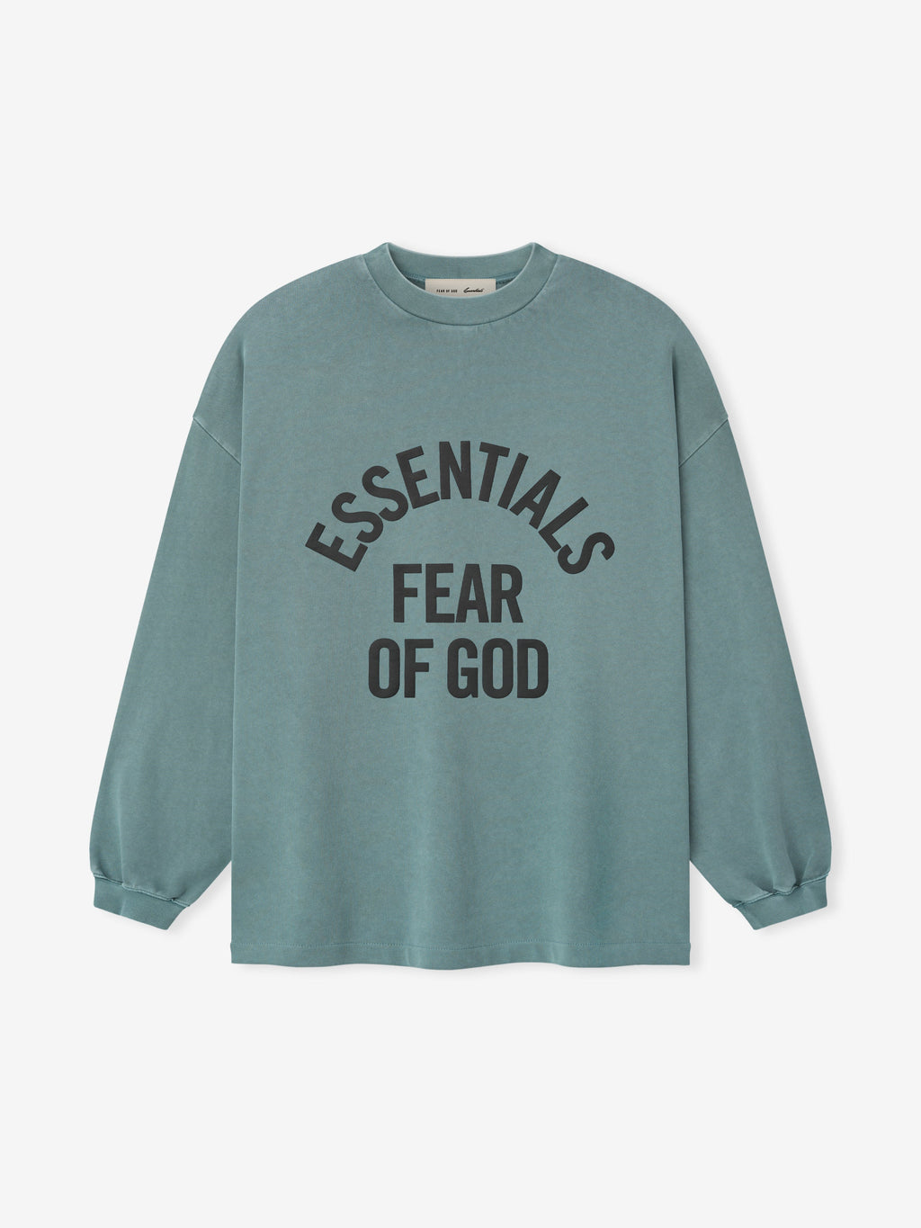 pigment-dyed heavyweight cotton long sleeve tee in muted teal with bold curved ESSENTIALS FEAR OF GOD text front