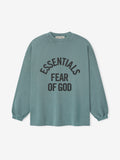 pigment-dyed heavyweight cotton long sleeve tee in muted teal with bold curved ESSENTIALS FEAR OF GOD text front