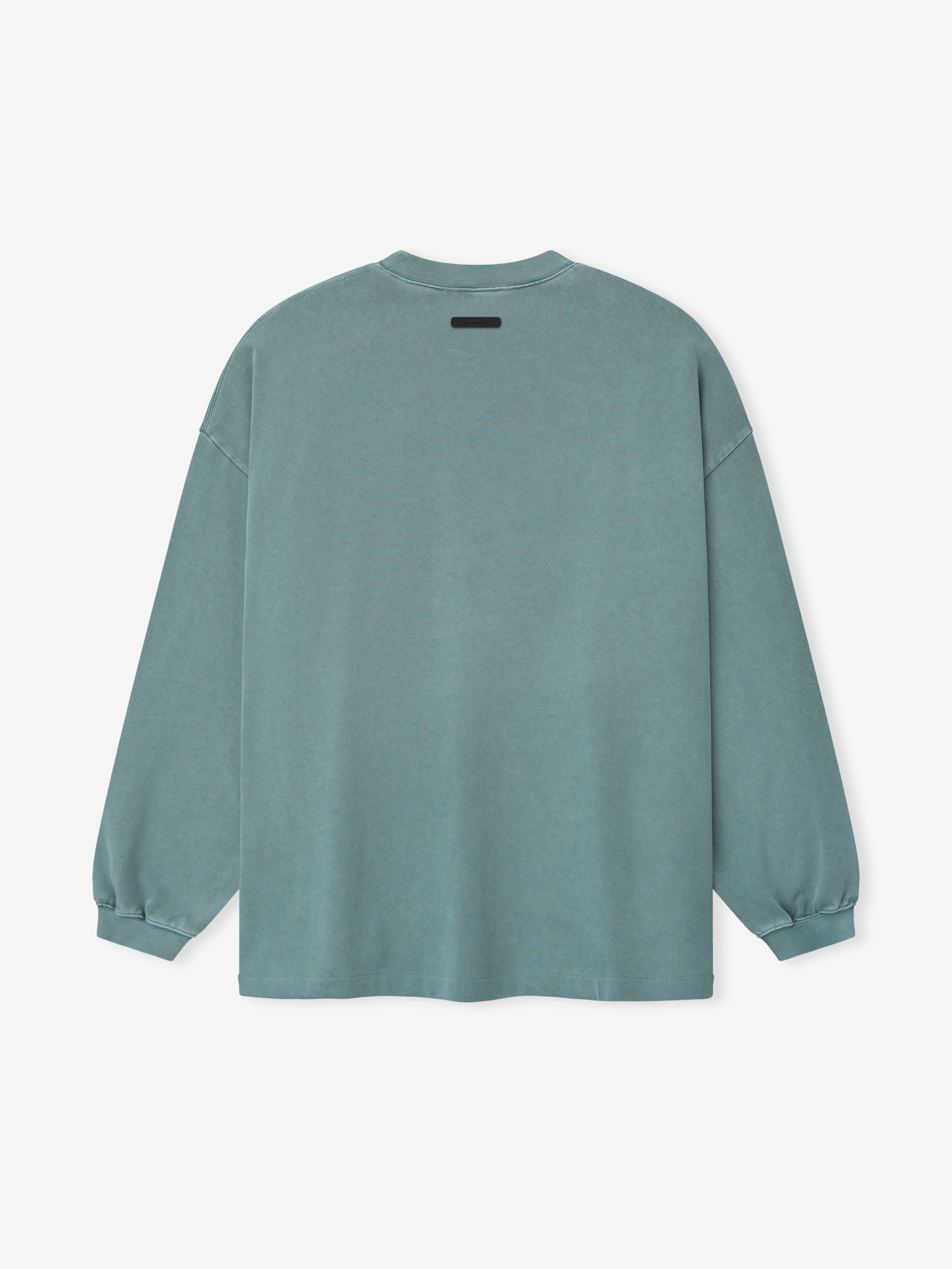 pigment-dyed heavyweight cotton long sleeve tee in muted teal with relaxed oversized 90s fit and crewneck design