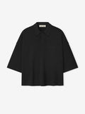 black medium-weight cotton poly pique cropped polo with oversized 90s fit and 3/4 sleeves