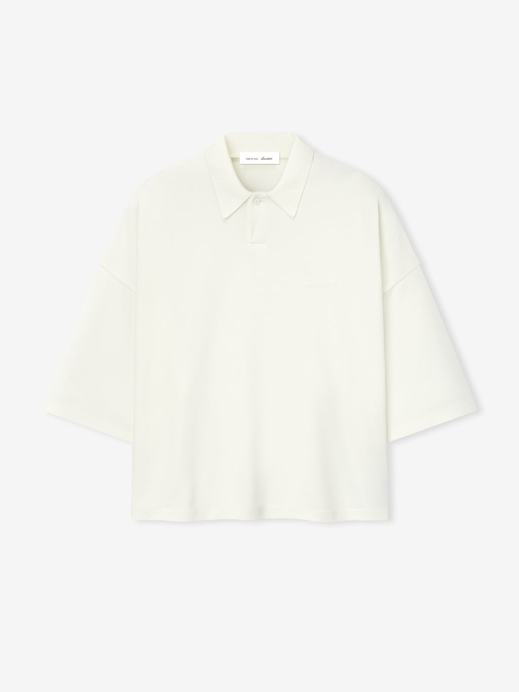 off-white medium-weight cotton poly pique cropped polo with minimalist collar and oversized 90s fit sleeves