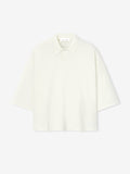 off-white medium-weight cotton poly pique cropped polo with minimalist collar and oversized 90s fit sleeves