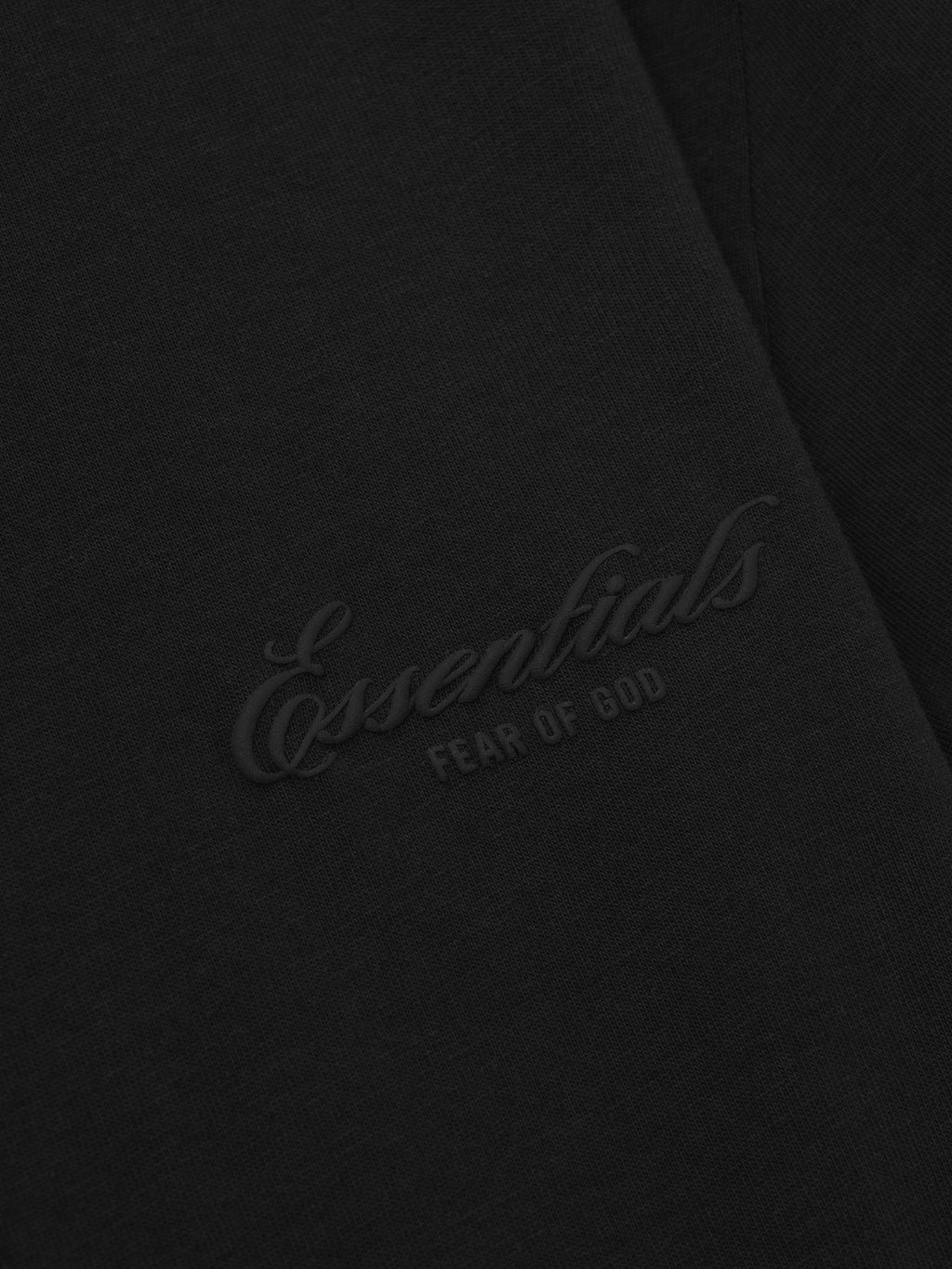 black cotton jersey fabric with subtle tonal puff-printed Essentials Fear of God logo detail
