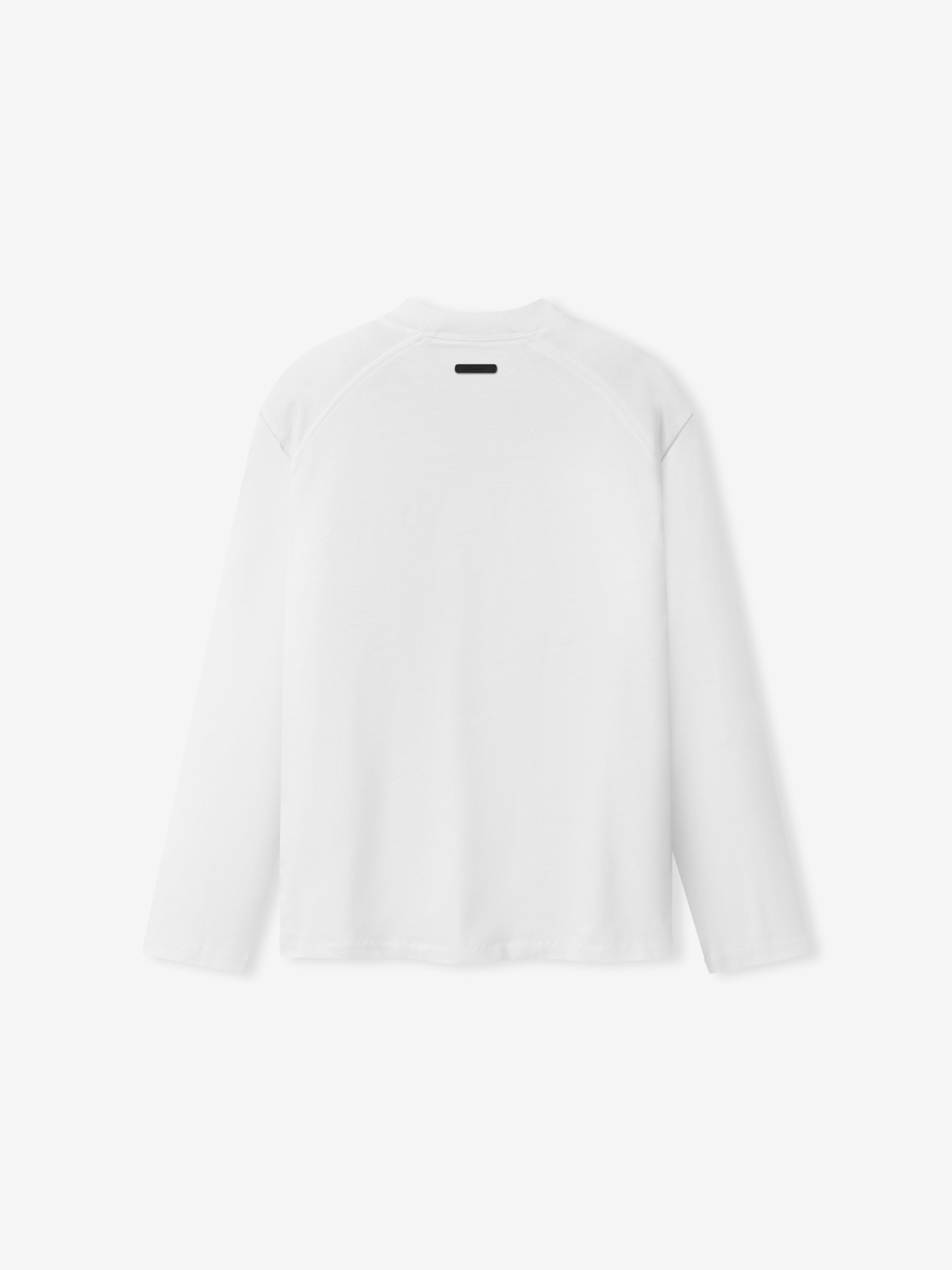 back view of white 220GSM cotton jersey women's classic fit long sleeve tee with rib-knit collar and small black label