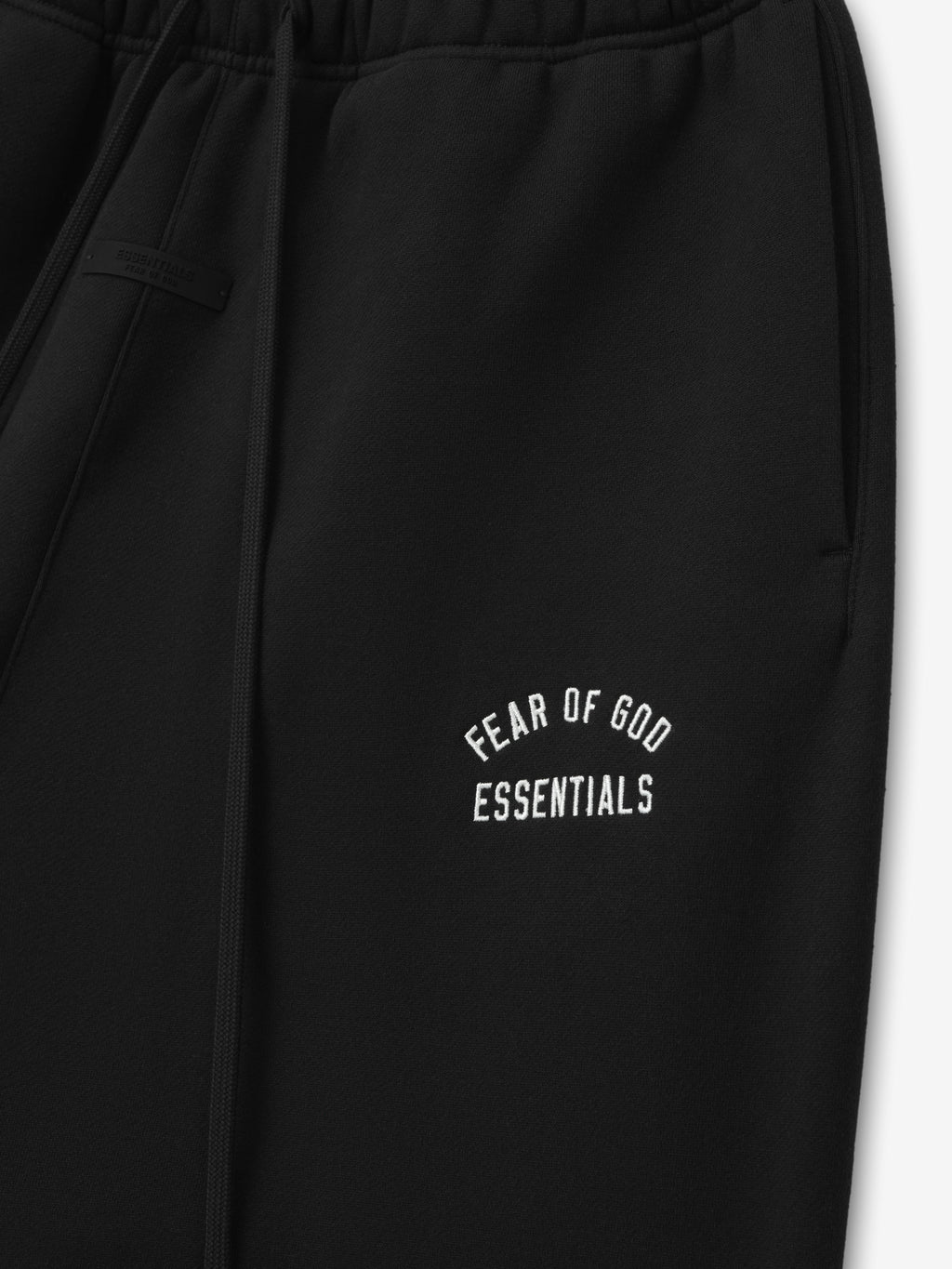 black relaxed fit sweatpant with embroidered Fear of God Essentials logo on thigh and elastic waistband detail