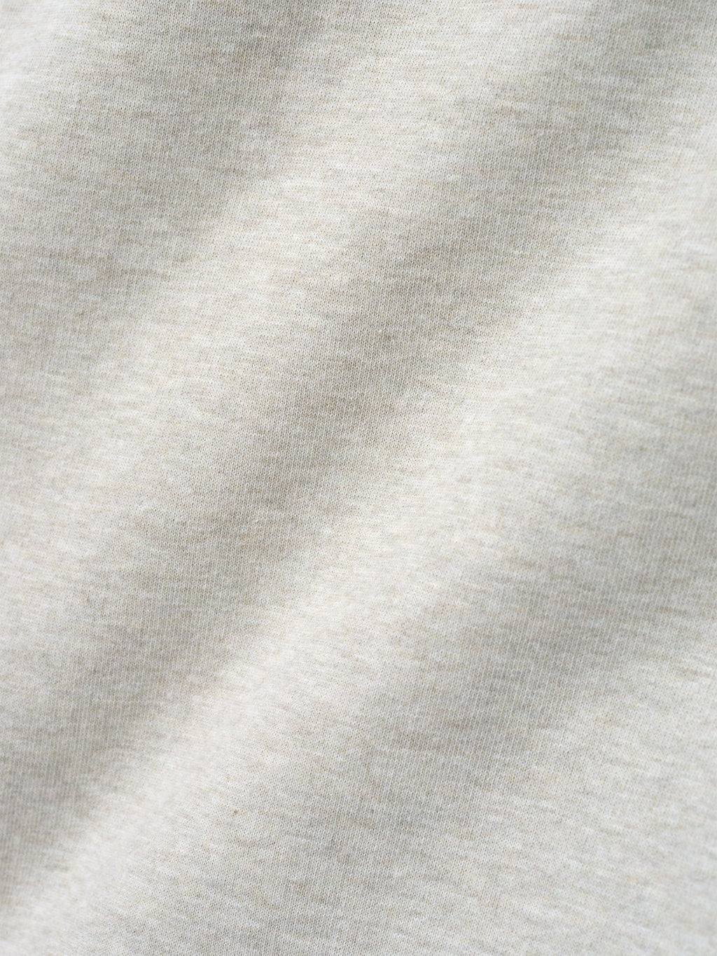 close-up of off-white heavyweight cotton fleece fabric with textured surface and soft appearance from NBA x Barkley Hendricks sweatpant