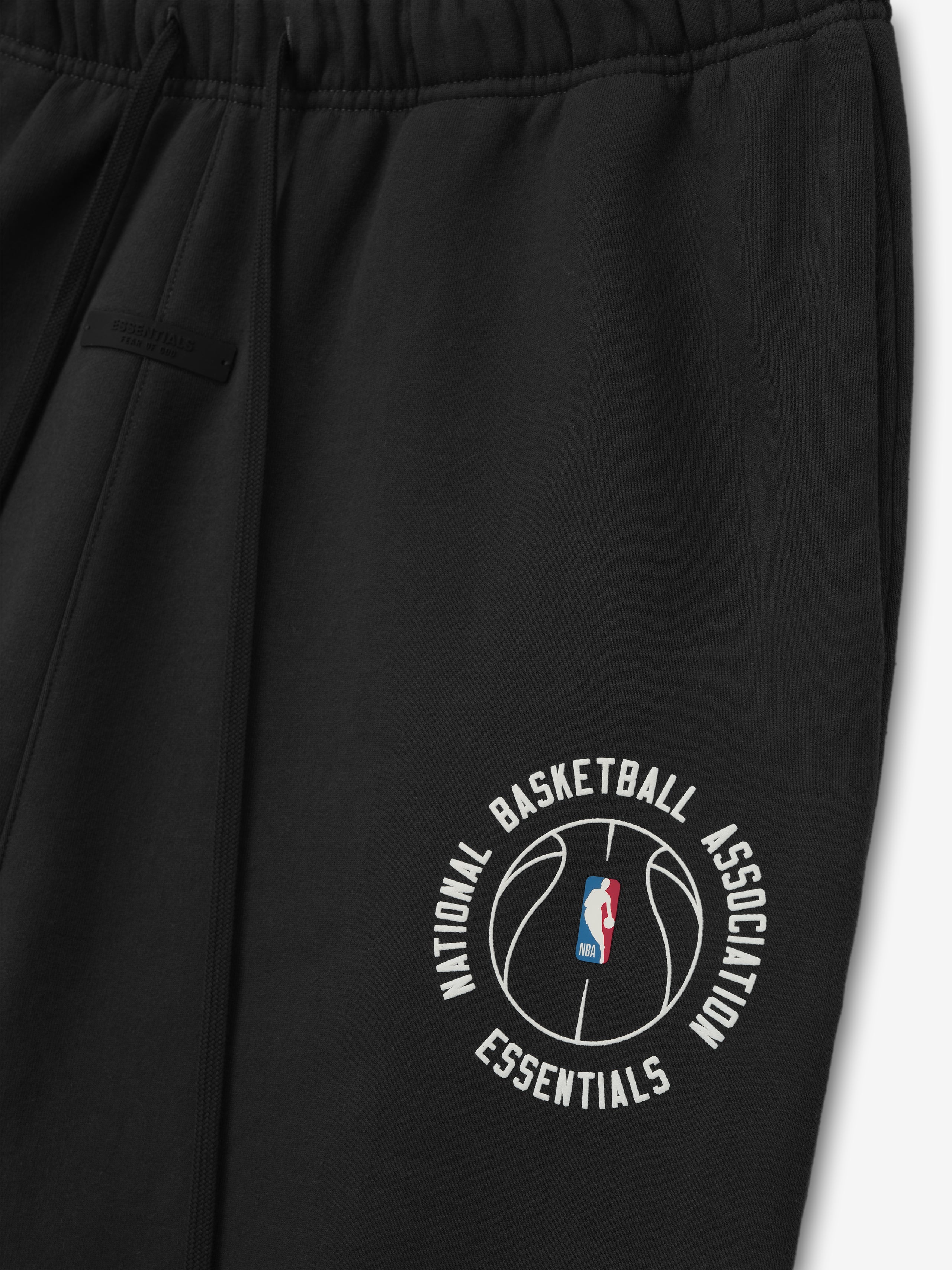 black heavyweight cotton fleece sweatpants featuring NBA Essentials basketball logo and elastic waistband detail