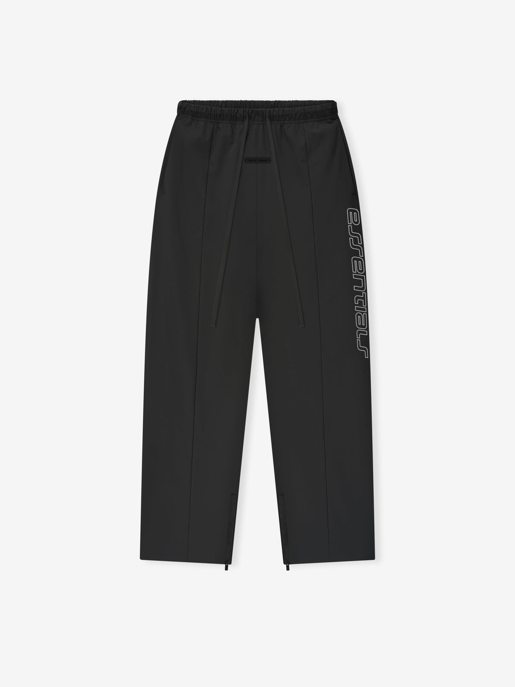 Vintage black Tech Nylon Relaxed Track Pant flat lay showing elastic waistband and vertical Essentials side logo text