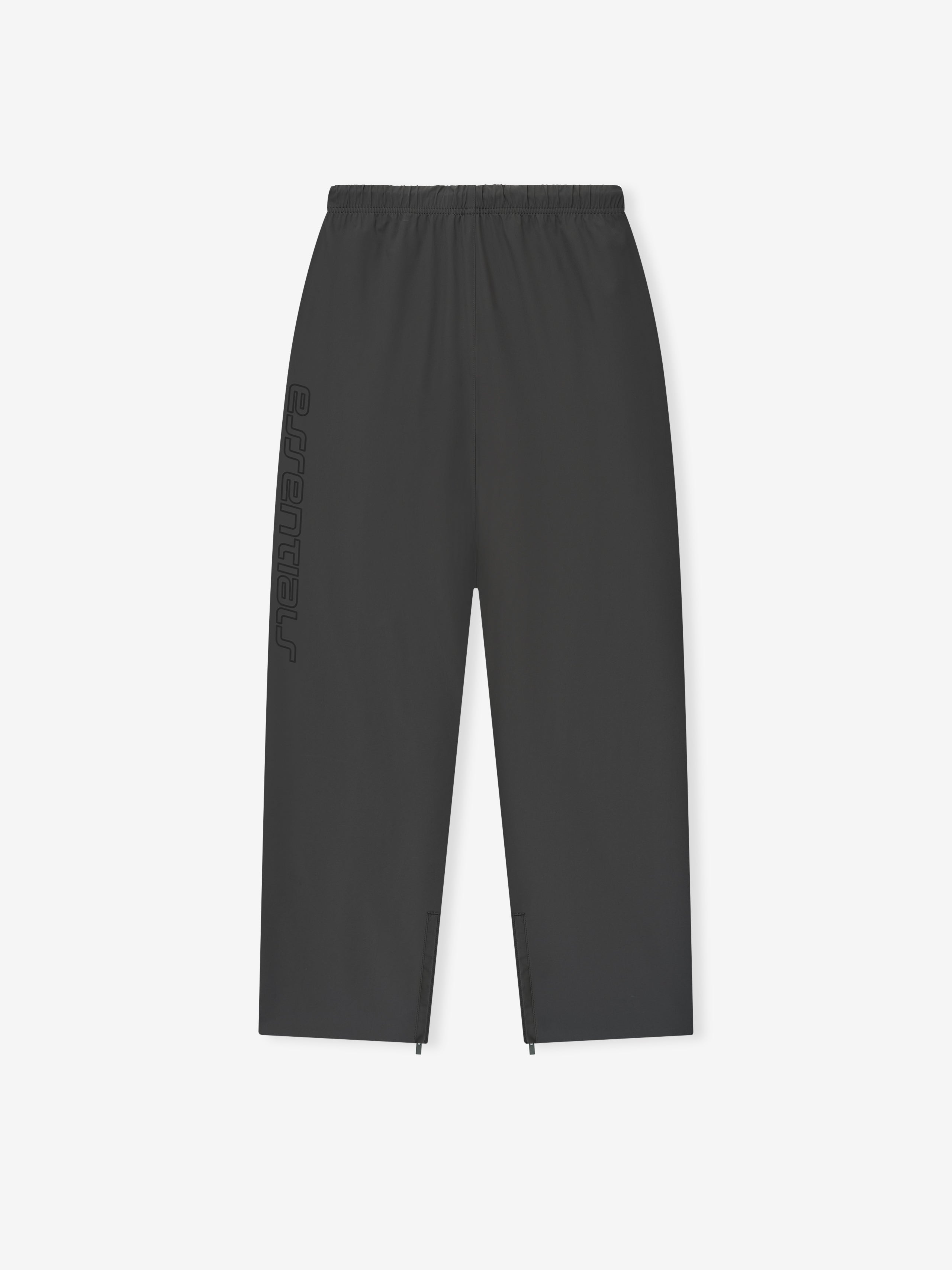 Front view of iron grey Tech Nylon Relaxed Track Pant with elastic waistband and subtle side logo print on white background
