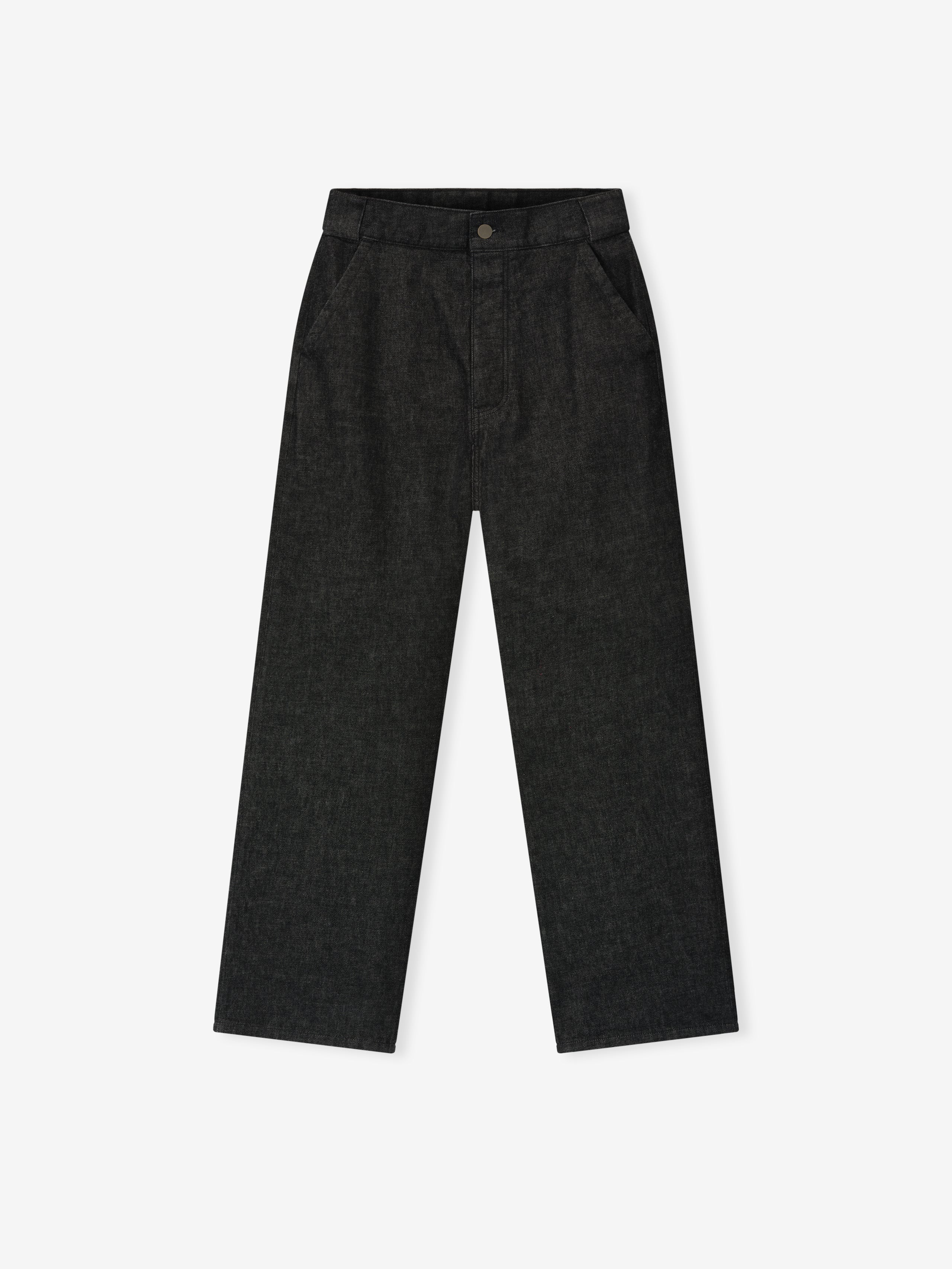 Vintage black denim work pants with straight leg cut and front pockets laid flat on white background