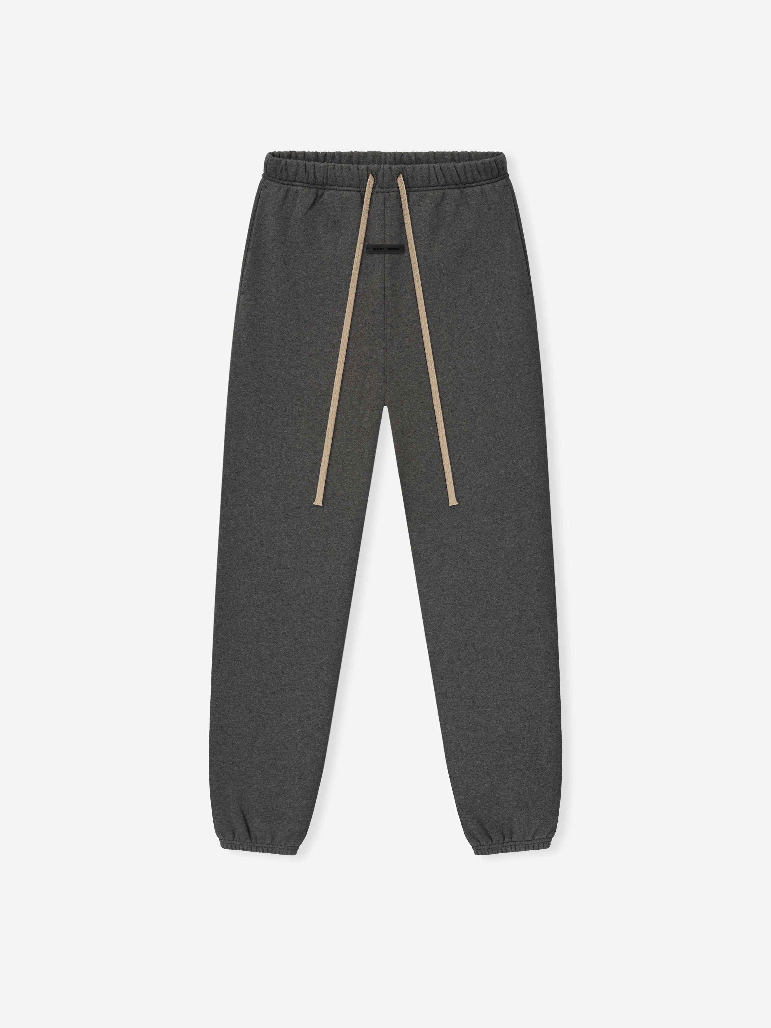 Charcoal gray sweatpants featuring elastic waistband, long beige drawstrings, and cuffed ankles in a slim classic fit
