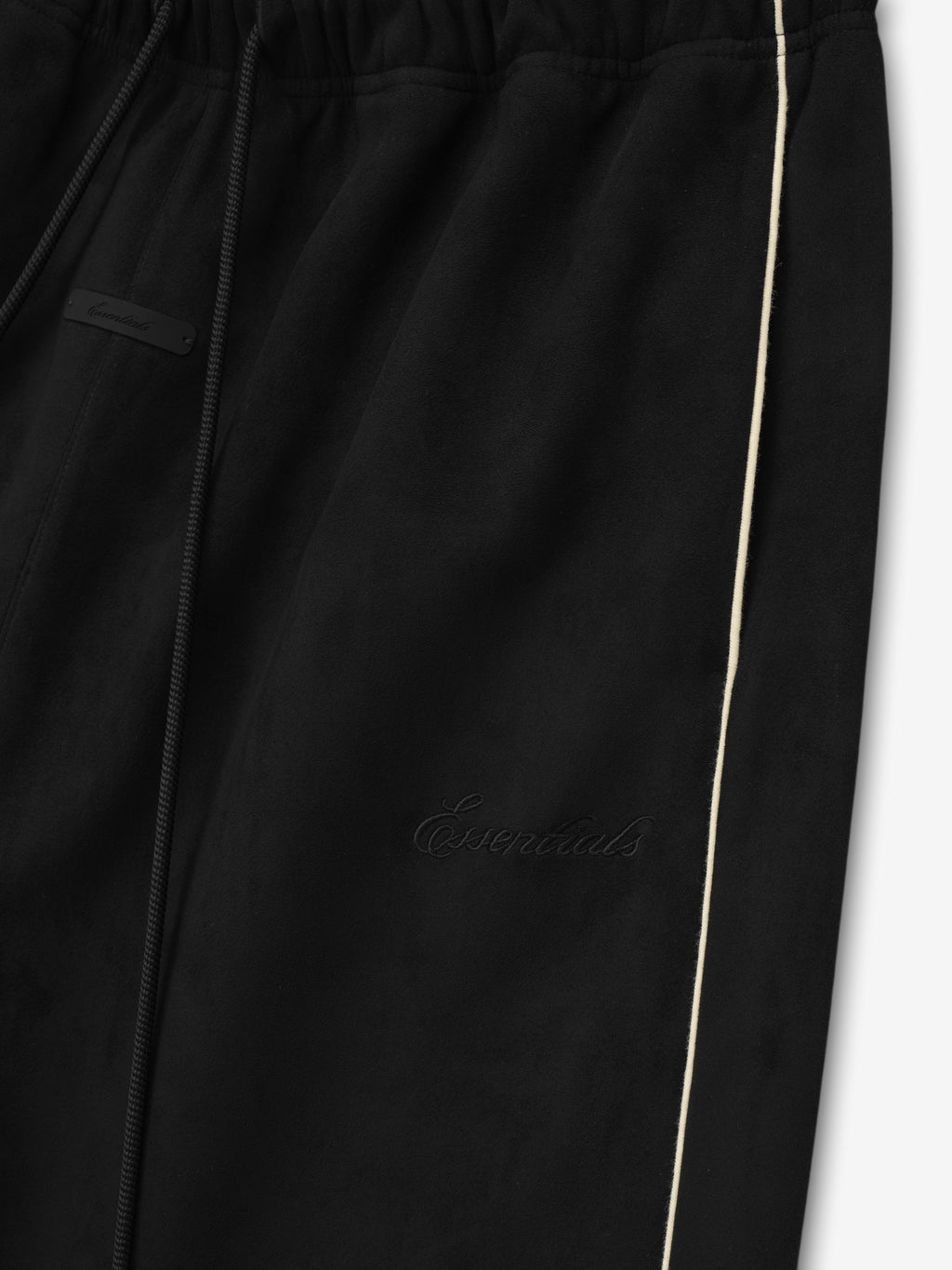 black bonded suede fleece relaxed pants with contrast piping and tonal Essentials embroidery on thigh