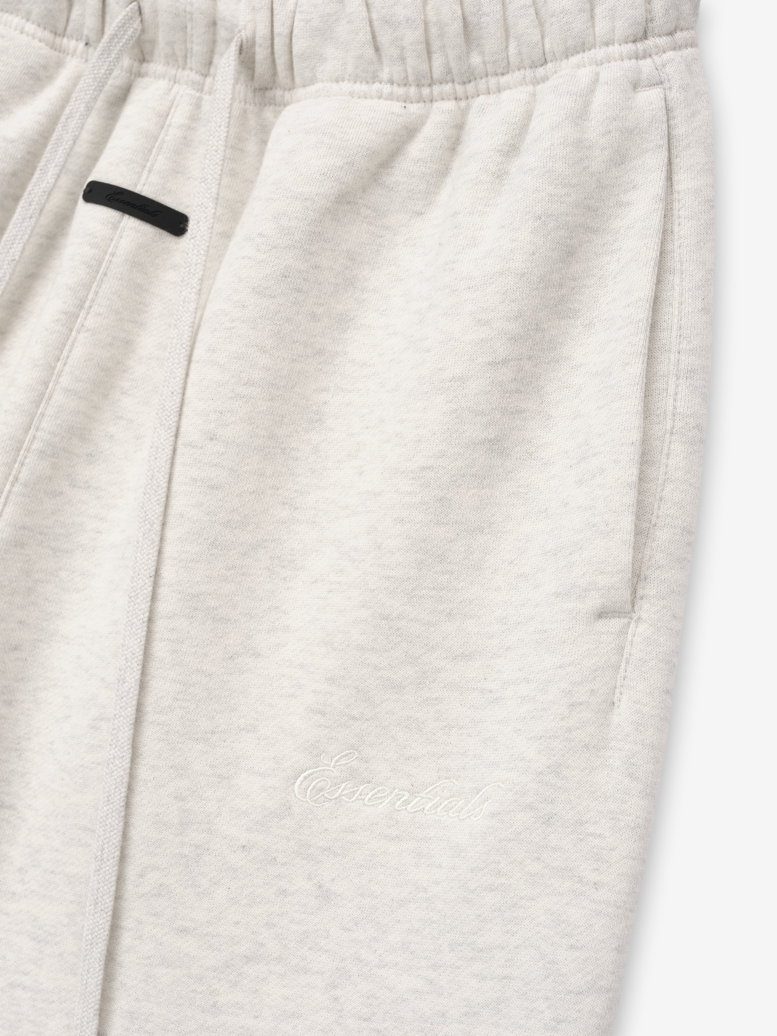 off-white women's relaxed silhouette classic flare sweatpants in 380GSM core fleece with elastic waistband and embroidered Essentials logo