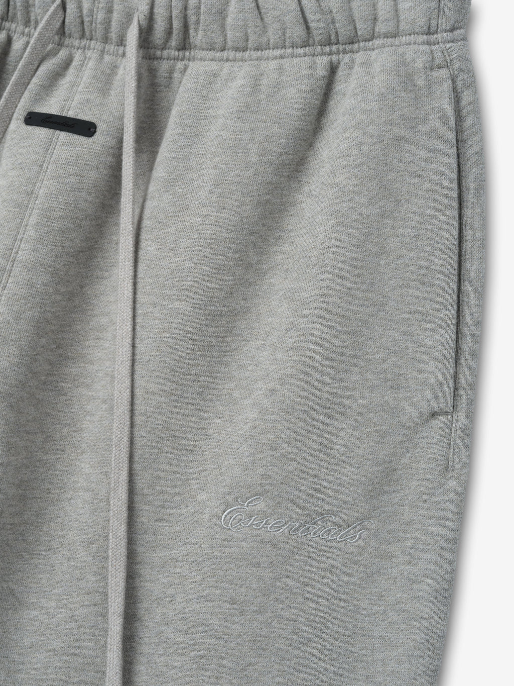 Gray sweatpants with a brand logo on a white background
