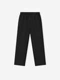 black relaxed fit sweatpants with elastic waistband, drawstring, and tonal embroidered Essentials logo along leg