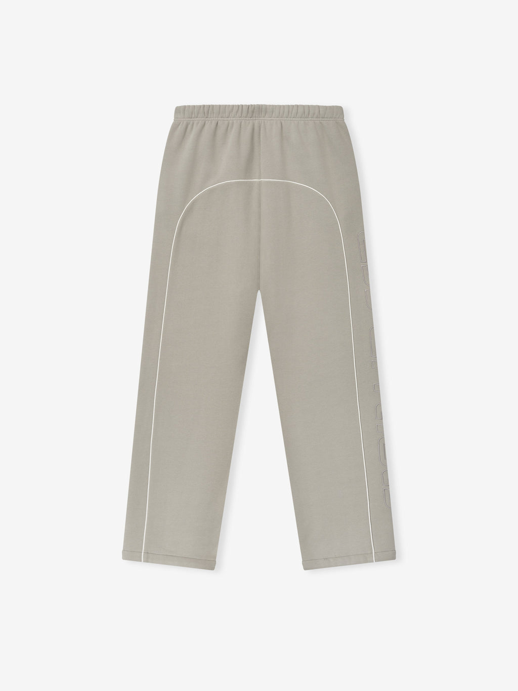 light taupe baggy sweatpants with elastic waistband, white sportswear piping, and tonal embroidered logo on side leg