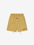 Front view of relaxed sweatshorts in canyon color with extended drawstrings and logo patch near hem on white background