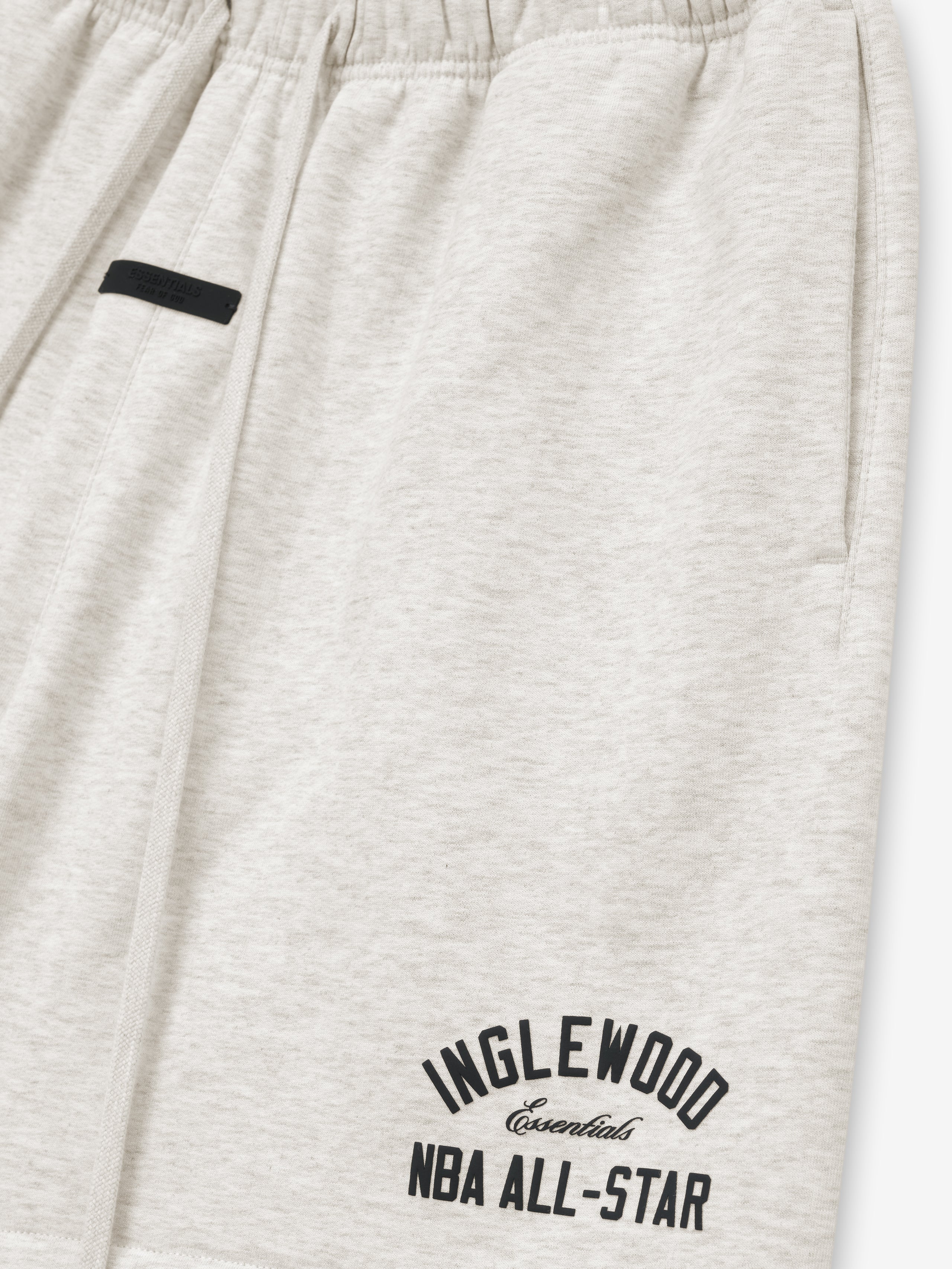 light beige heavyweight cotton fleece sweatshorts with elastic waistband and puff-printed Inglewood NBA All-Star logo on leg