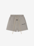 Grey shorts with drawstring on a white background