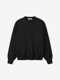 Black sweater on a white background