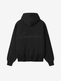 Back view of black hoodie with large cursive "Essentials" logo printed across the back and ribbed cuffs and hem