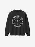 black heavyweight crewneck sweatshirt with circular NBA logo and National Basketball Association Essentials text on front