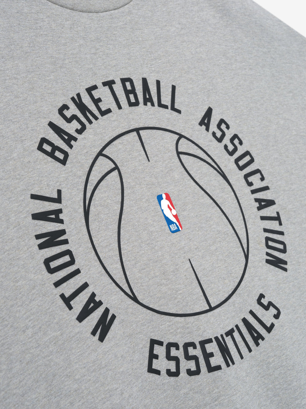 light grey crewneck with black outlined basketball graphic and circular National Basketball Association Essentials text on front
