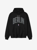 Front-facing black Berlin 90's Hoodie with large curved grey Berlin text and small NBA logo below pocket, gallery 0.
