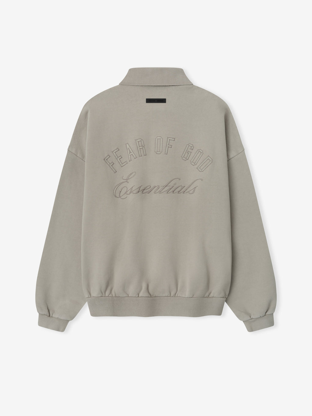 Back view of smoke grey classic polo sweatshirt with raised embroidered "Fear of God Essentials" text and ribbed hem and cuffs