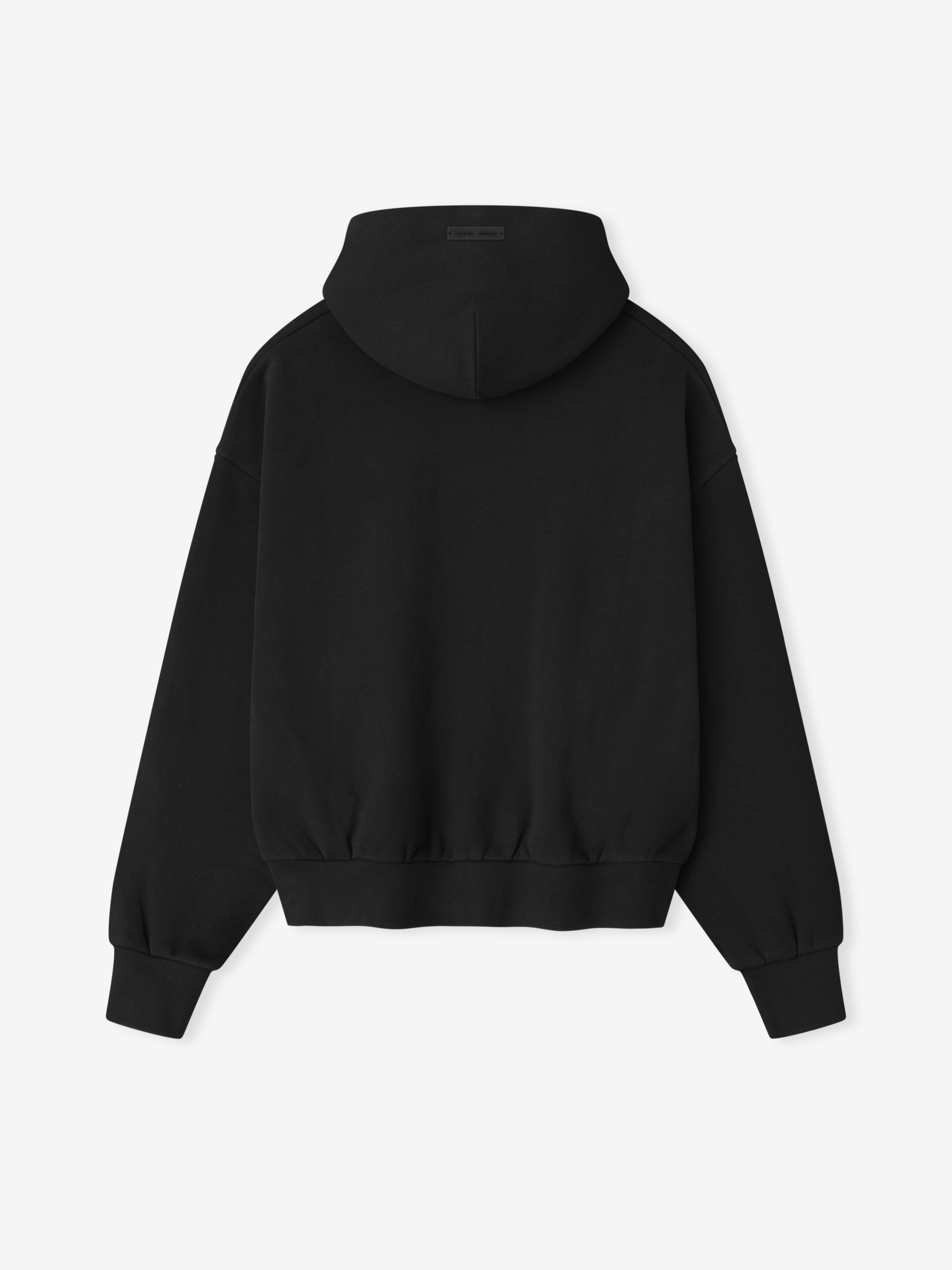 Back view of vintage black Classic Fleece Hoodie showing clean silhouette and ribbed cuffs in gallery position zero