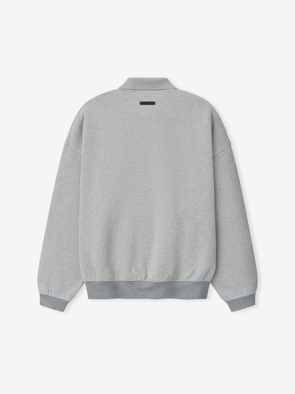 light gray 90s-inspired sweatshirt with relaxed fit, ribbed cuffs and hem, and a small rectangular patch on upper back