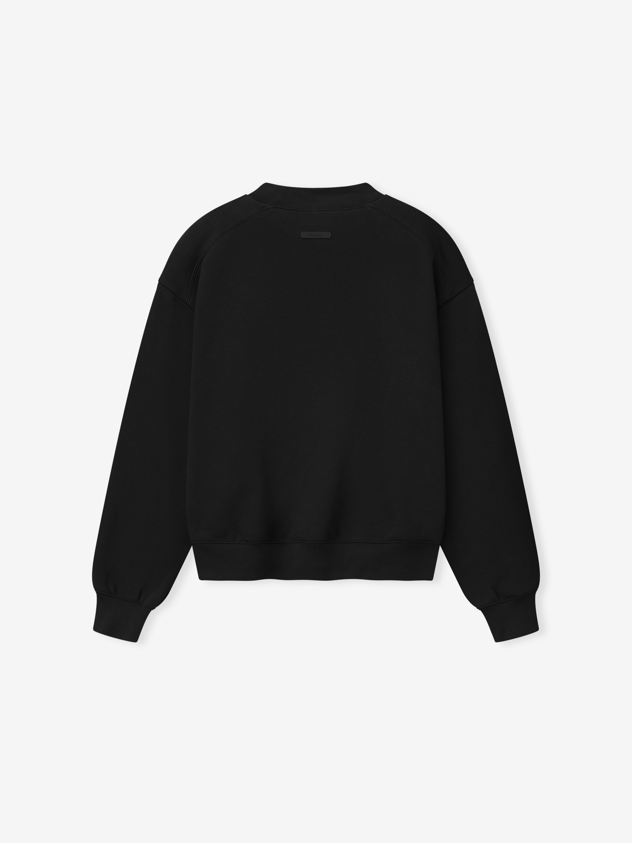 back view of womens black classic crewneck sweatshirt with ribbed cuffs and hem on core fleece fabric