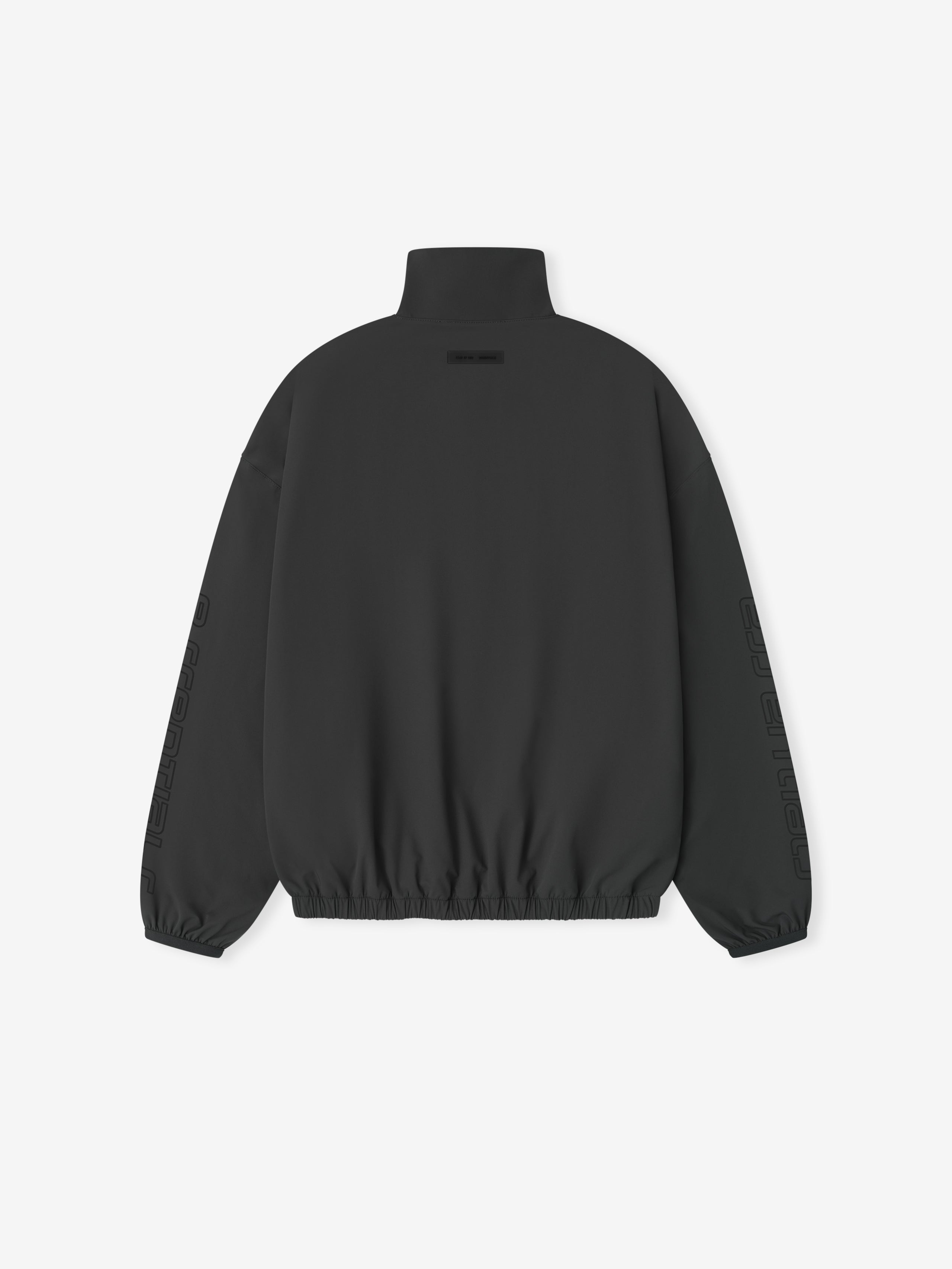 Back view of iron grey womens nylon half zip track jacket with elasticated hem and subtle sleeve branding gallery 0