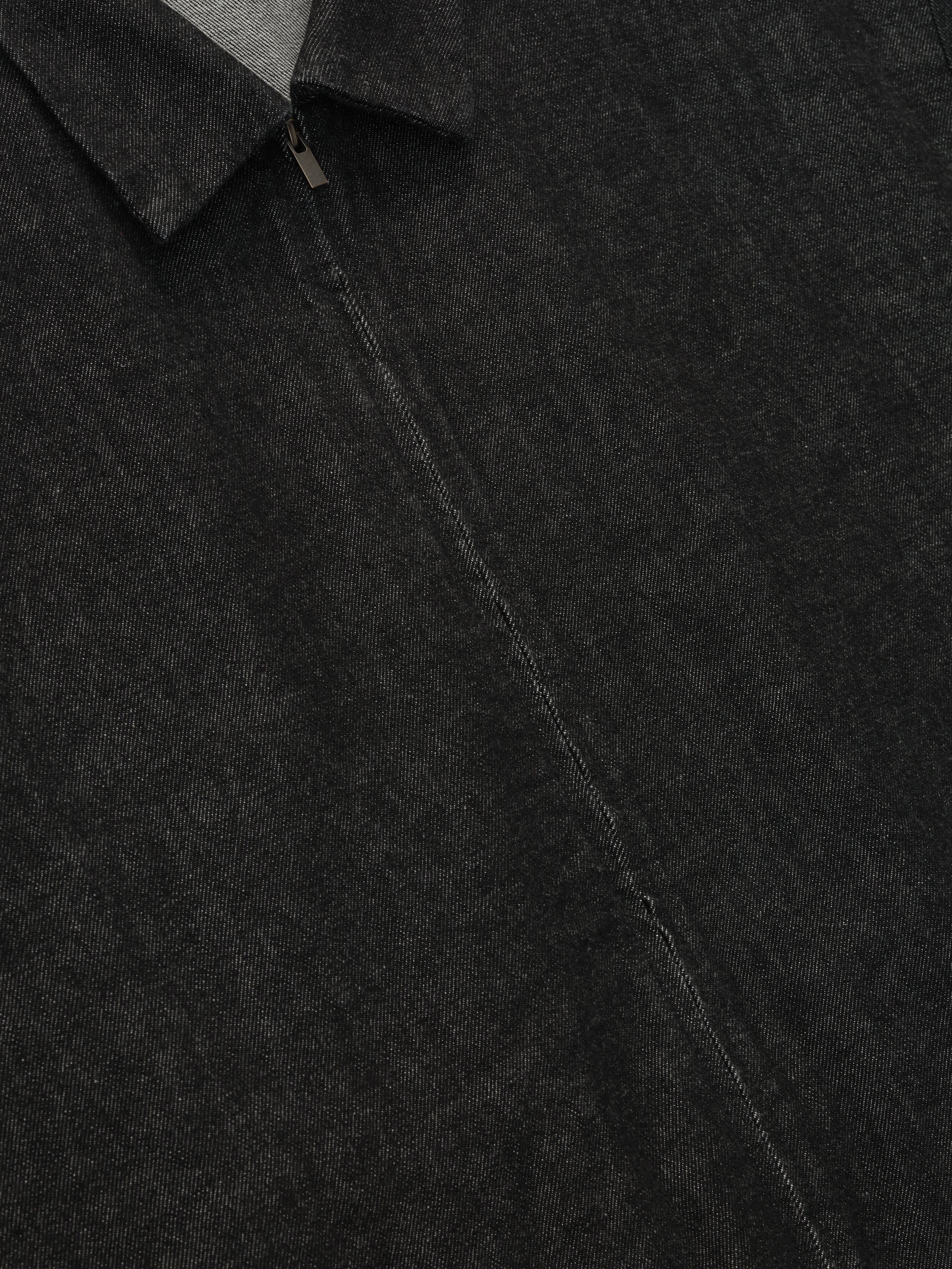 Close-up of vintage black denim full zip work shirt showing collar and zipper detail, gallery image 0