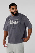 4149 - Gothic Tees- Oversized tee with bold gothic-inspired graphics on the back, structured yet comfortable, offering a sharp, wearable edge and statement-making style in Grey Wash 