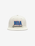off-white NBA Essentials snapback cap with blue and red embroidered logo on front panel