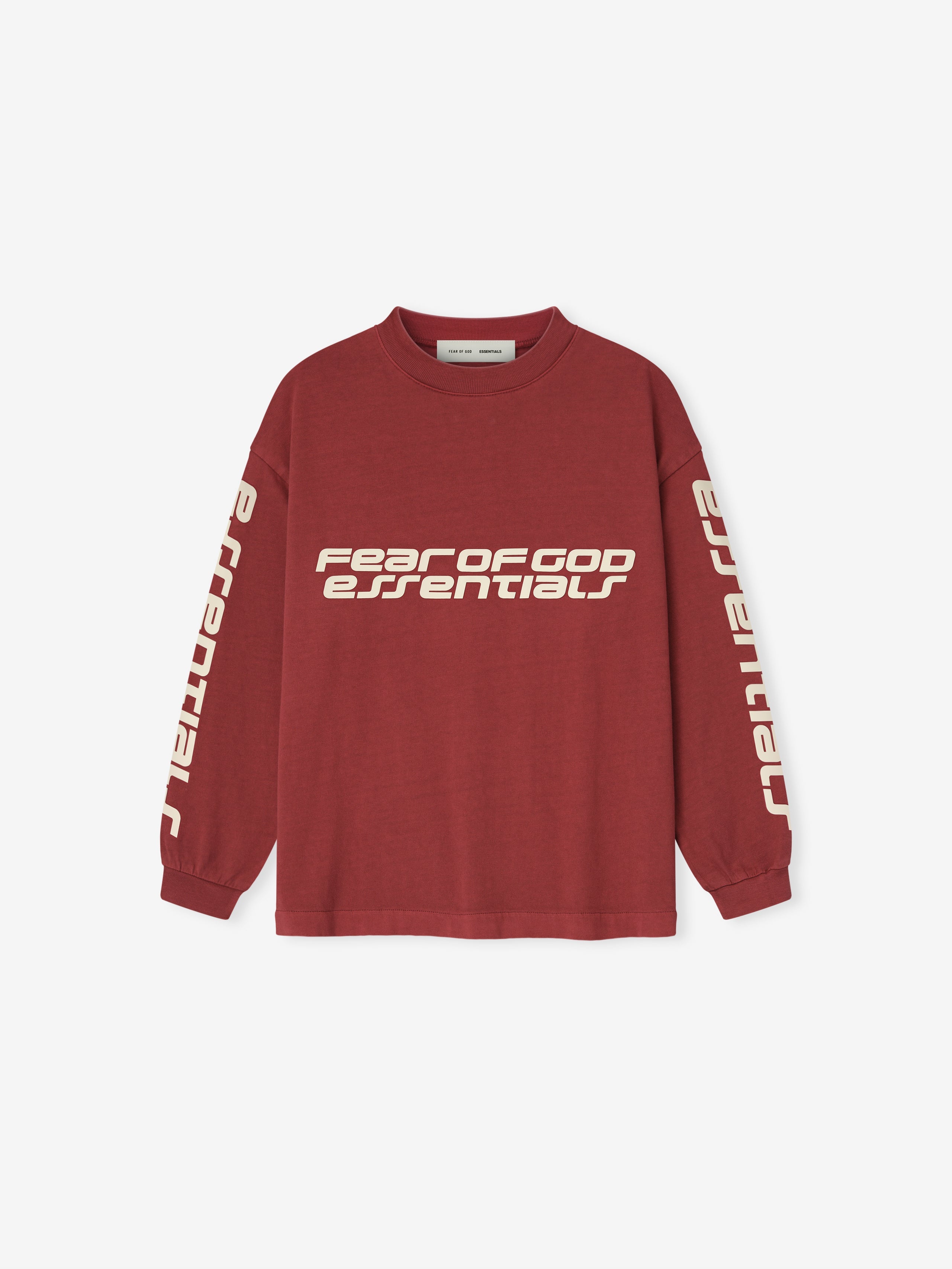 Front view of crimson Kids Classic Long Sleeve Tee with bold Fear of God Essentials print across chest and down sleeves, gallery position 0