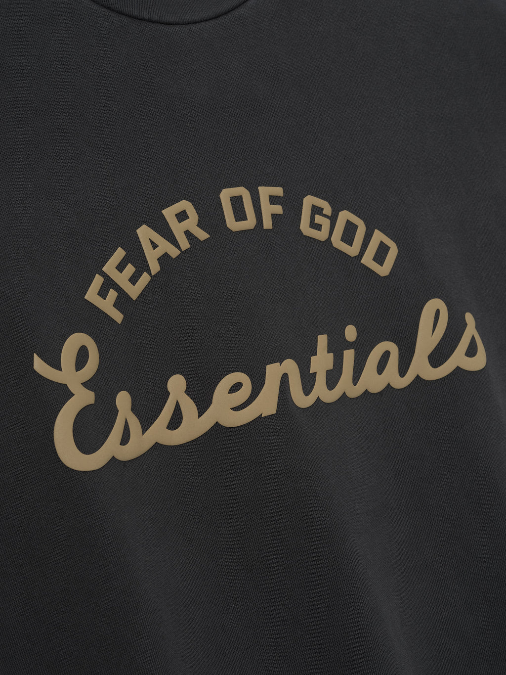 Black t-shirt with 'Fear of God Essentials' text in beige.