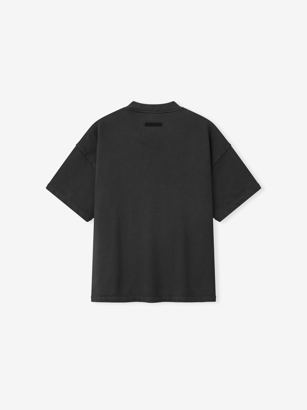 back view of black heavyweight cotton 90s fit kids tee with minimal branded tag near neckline