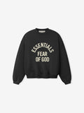 black kids crewneck sweatshirt with Essentials Fear of God logo printed in cream arched text on front