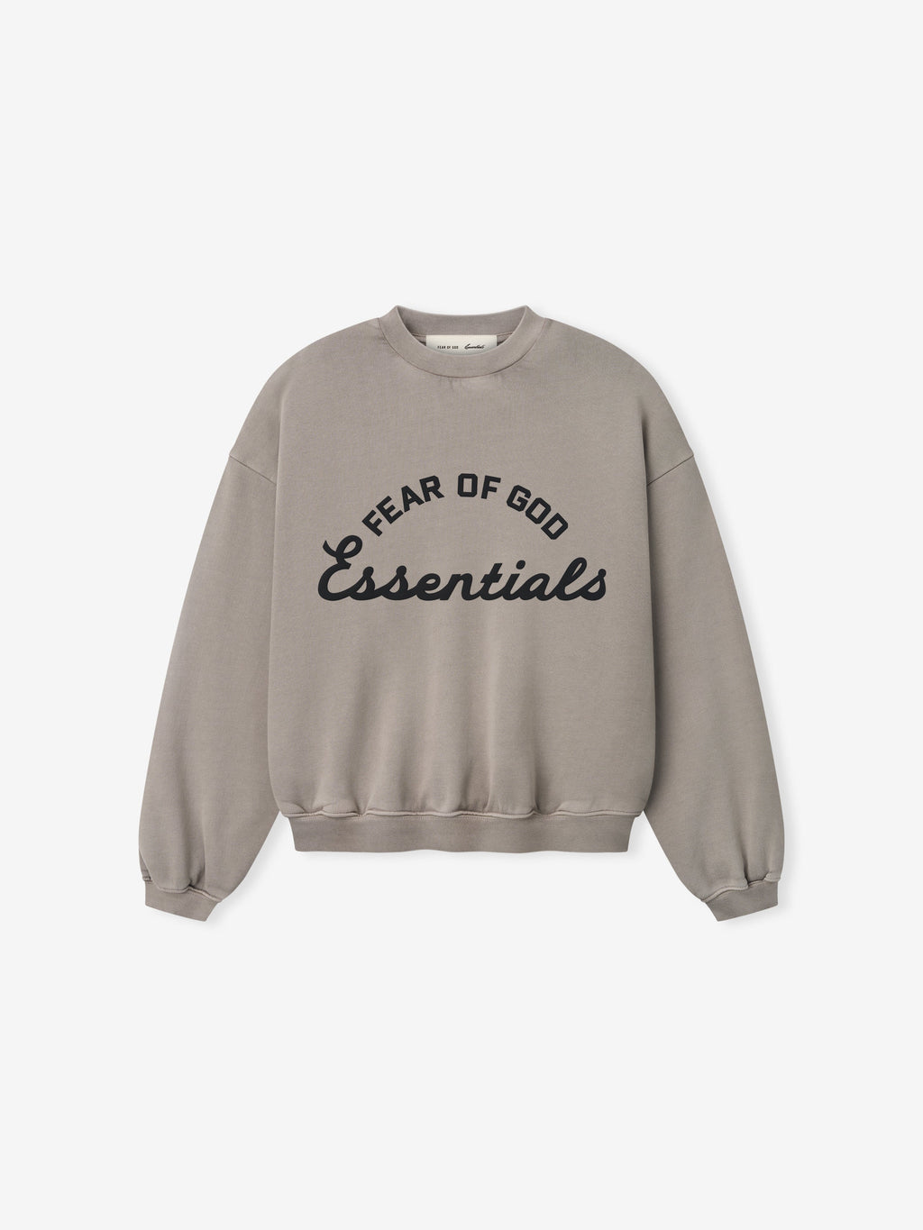 Light brown crewneck sweatshirt with black "Fear of God Essentials" text in curved and script fonts on front center