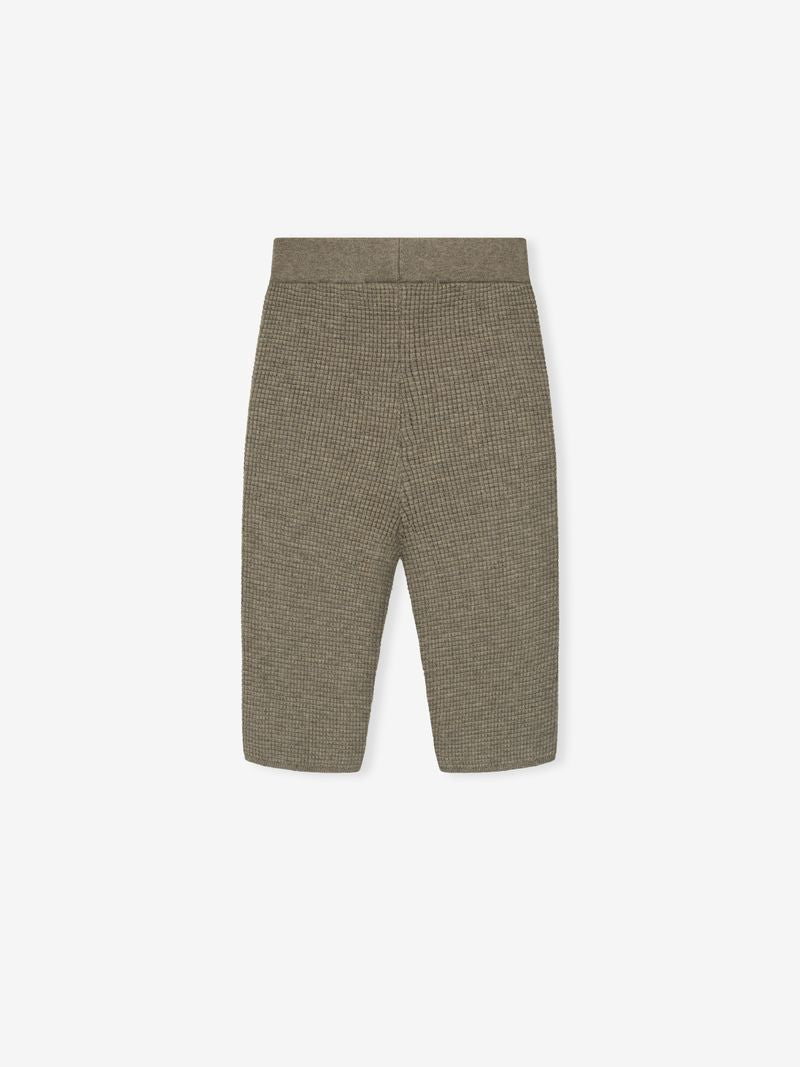 taupe women's waffle knit biker shorts with textured fabric and elastic waistband laid flat on white background