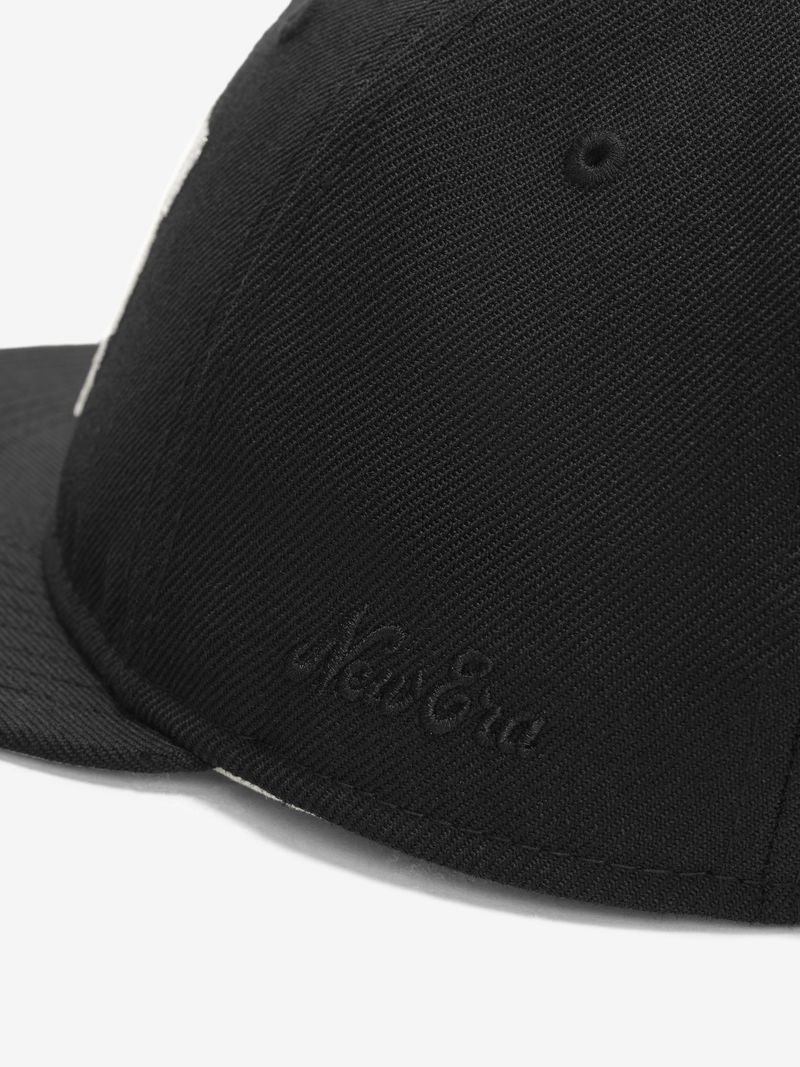 Close-up of black Spurs 9Fifty RC Snapback showing subtle black New Era embroidery on side panel FEiB2sMg.jpg