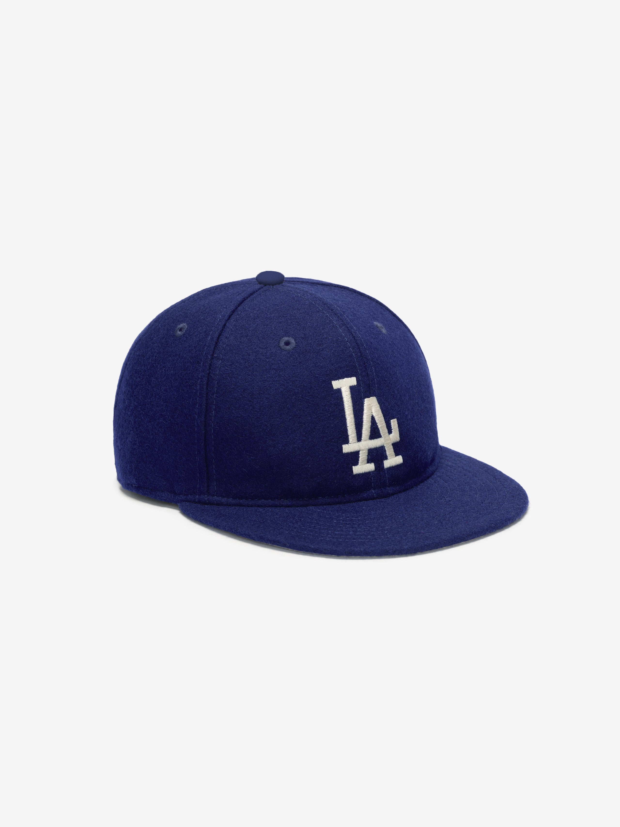 Angled front view of Los Angeles Dodgers Wool Retro Crown 59FIFTY  fitted cap with white LA logo and white button top