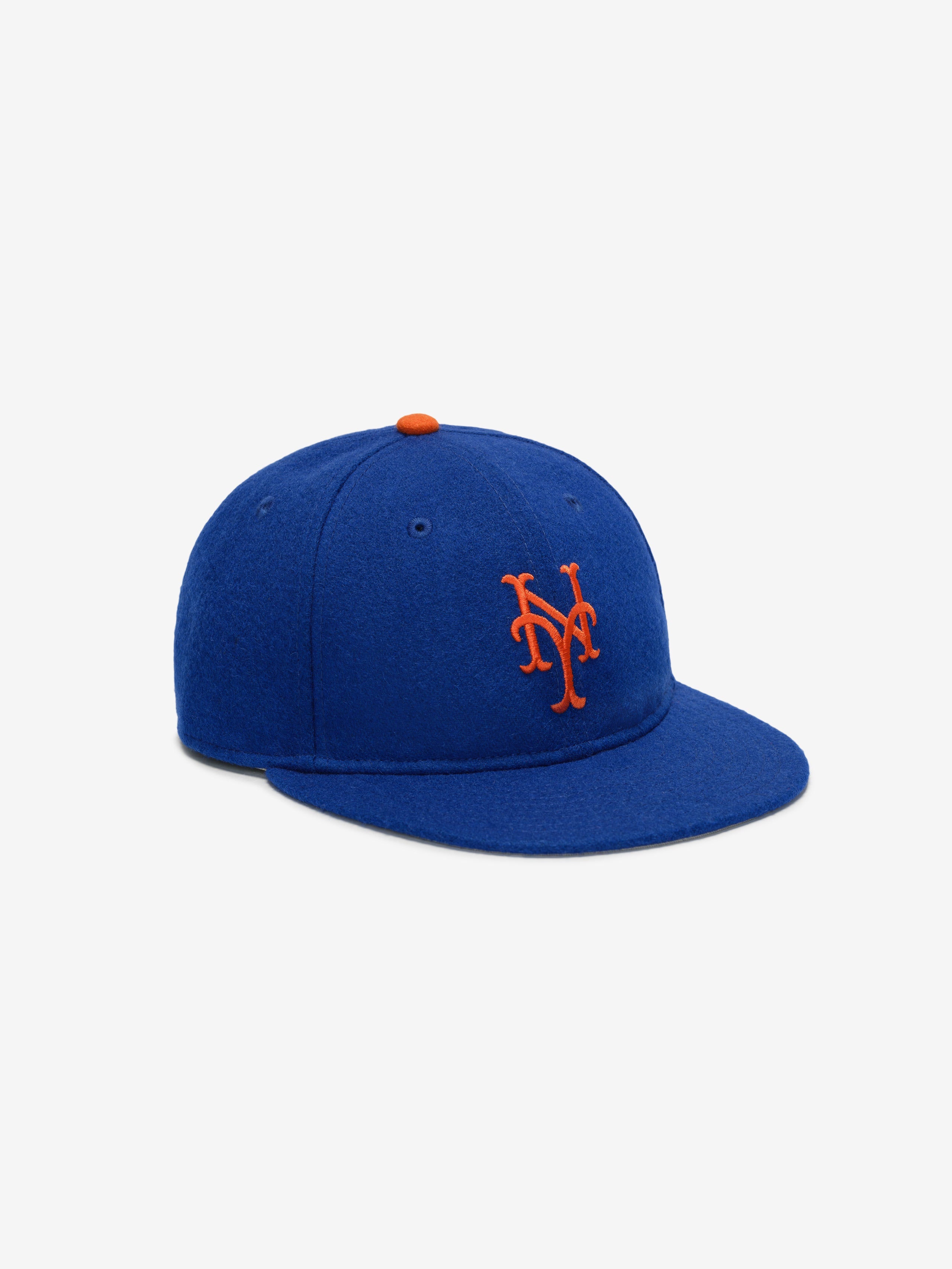 Three-quarter view of New York Mets Wool Retro Crown 59FIFTY fitted cap with raised orange NY logo and matching button on top