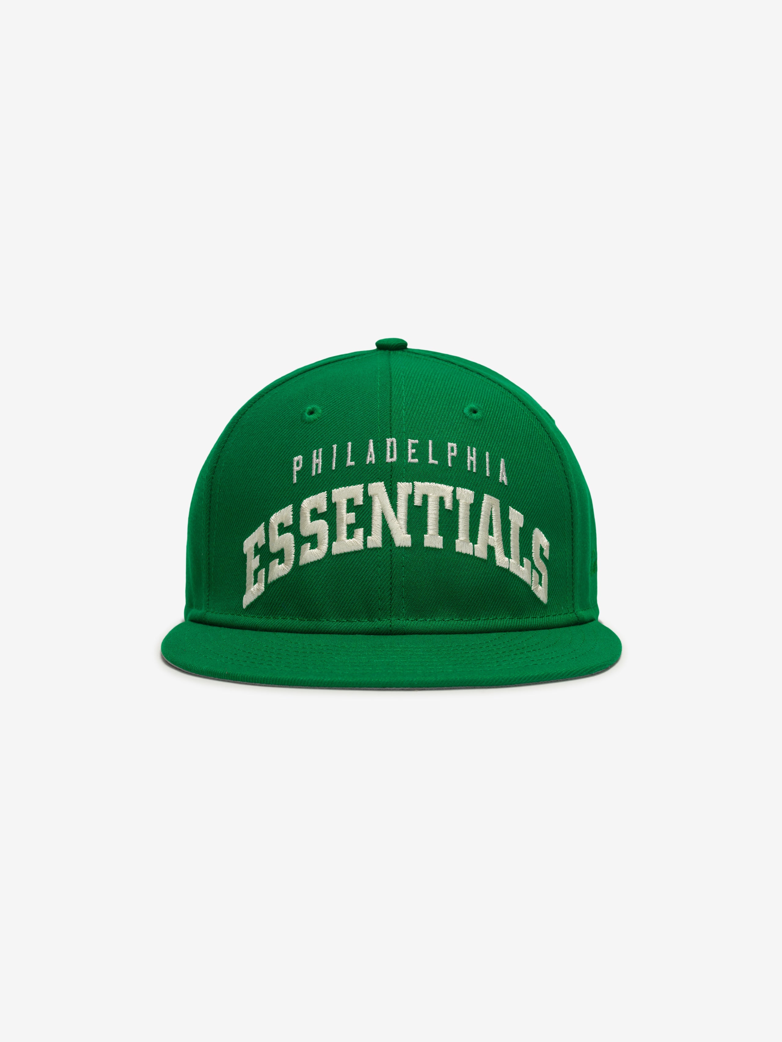 Front view of green Eagles 9Fifty RC Snapback with white Philadelphia Essentials text on crown, gallery image 0