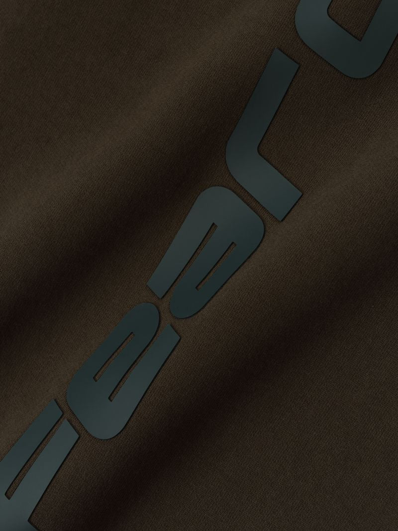 Close-up of olive Heavy Fleece Flare Sweatpant fabric with embossed black vertical lettering, gallery image 0, file Jai0lvlw.jpg