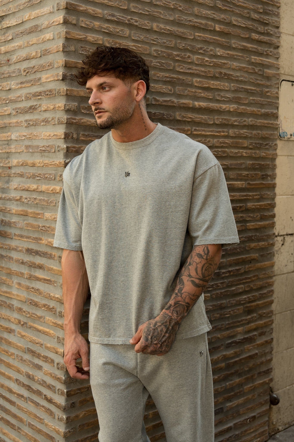4153 - Elevated Essentials - Relaxed Tee - Oversized heavyweight cotton tee with drop shoulders, natural drape, and subtle 'Elevated' detailing in colour Heather Grey.