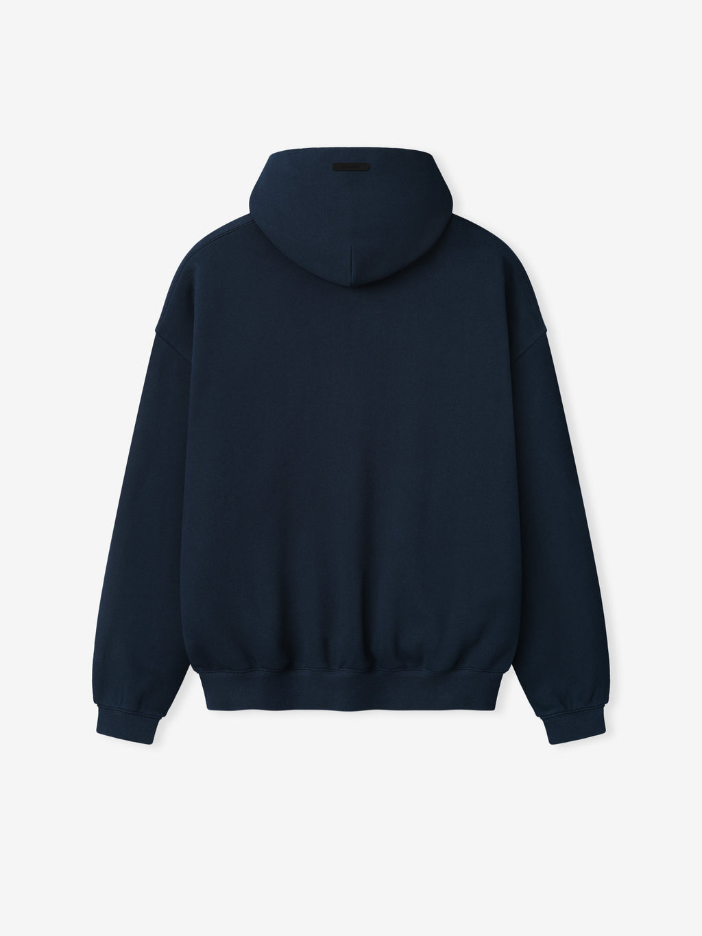Back view of plain dark navy hoodie with ribbed cuffs, waistband, and small black rectangular patch on hood